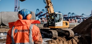 man typing on keyboard
